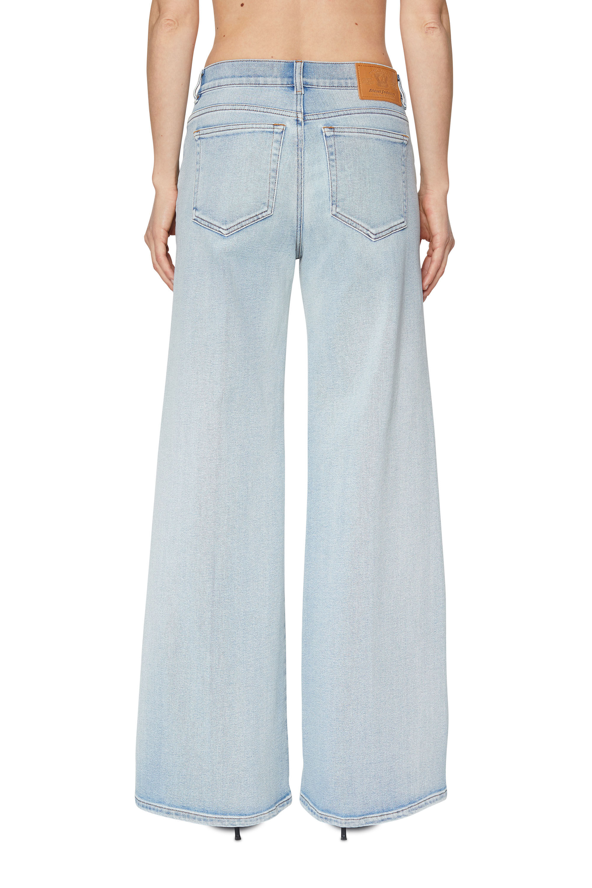 Bootcut light blue jeans top