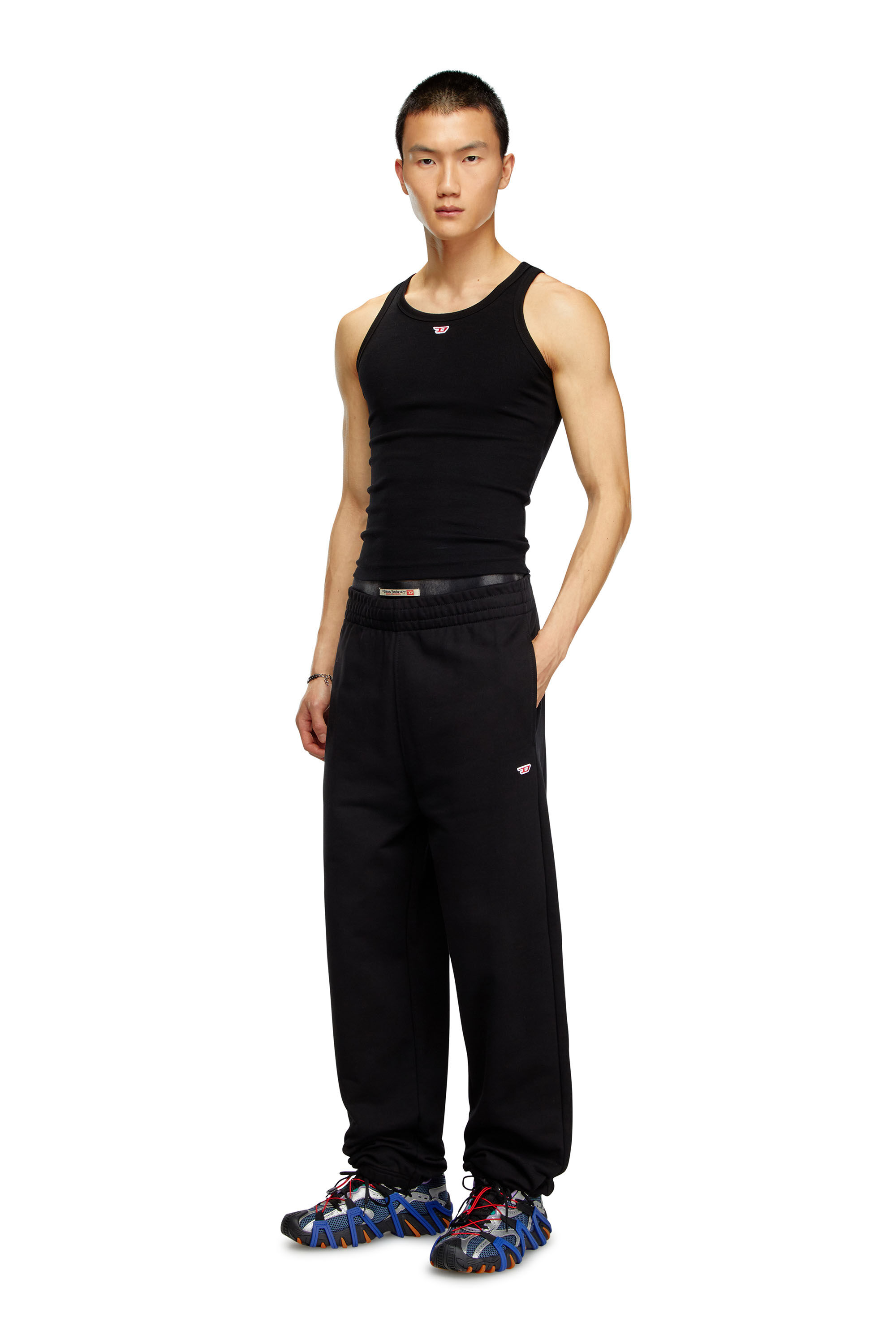 Men's Track pants with embroidered D patch | Black | Diesel