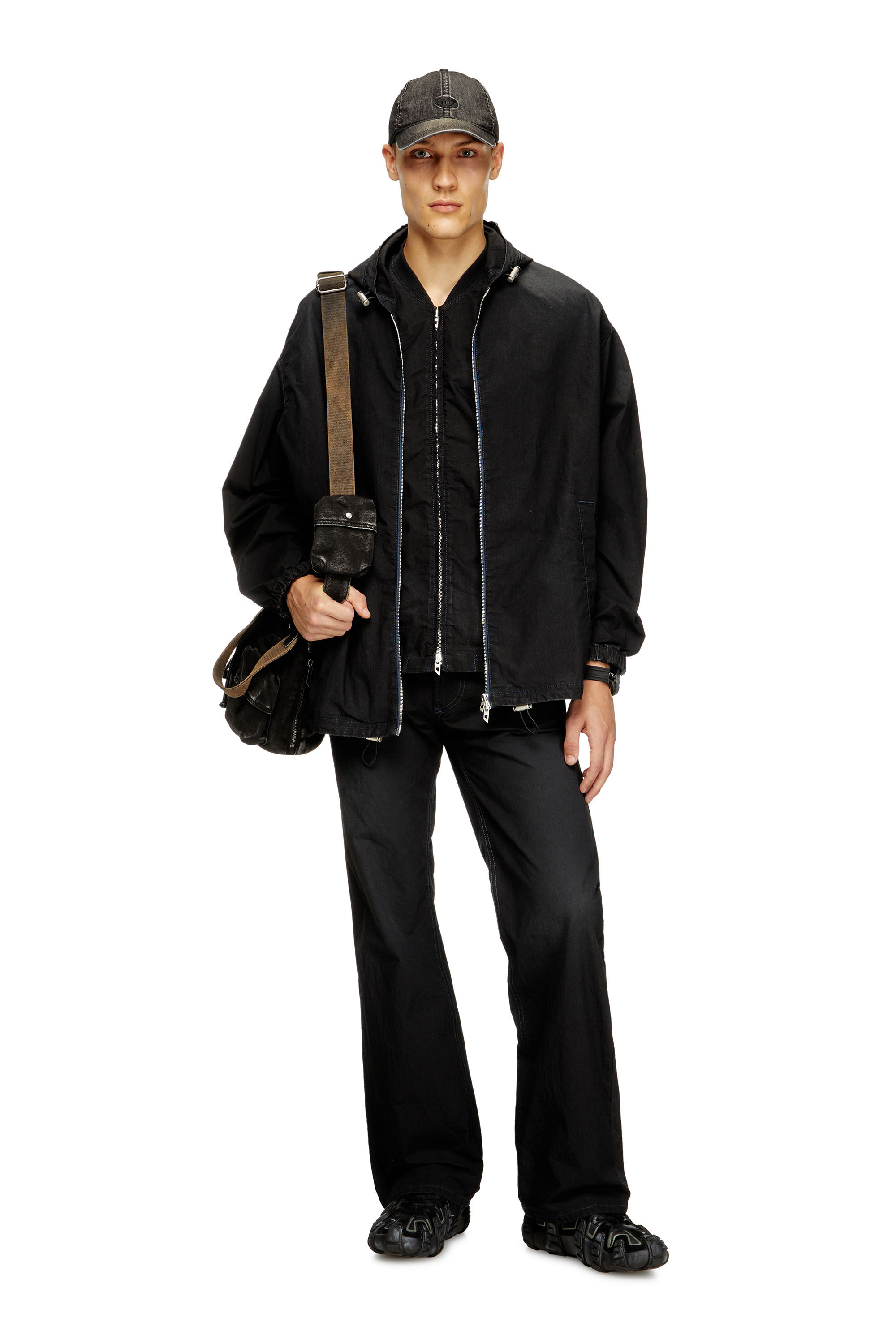 Diesel - D-WYNNY JOGG, Veste technique à capuche en tissu JoggJeans Homme in Noir - 1